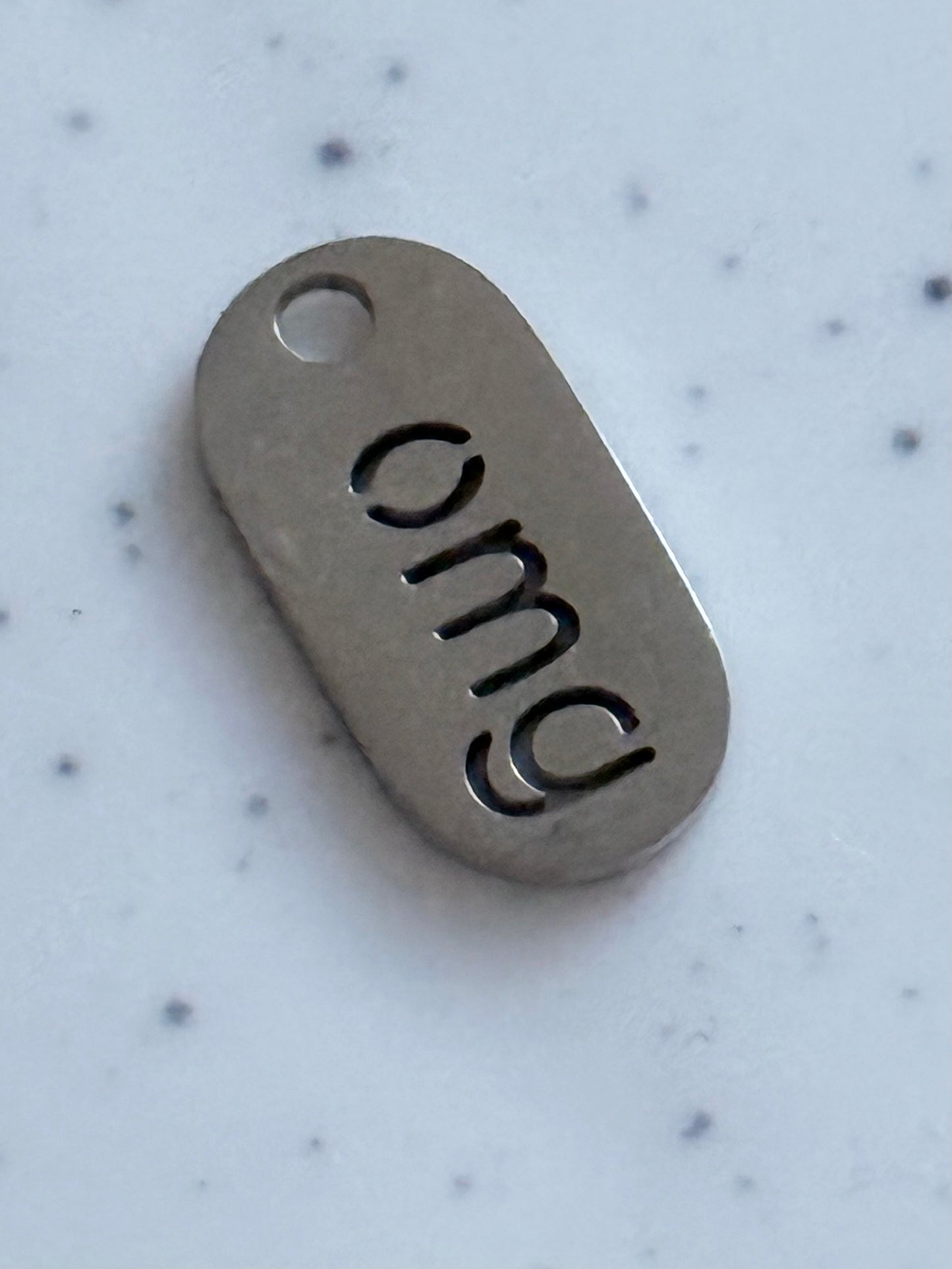 Silver “omg” Tag Charm