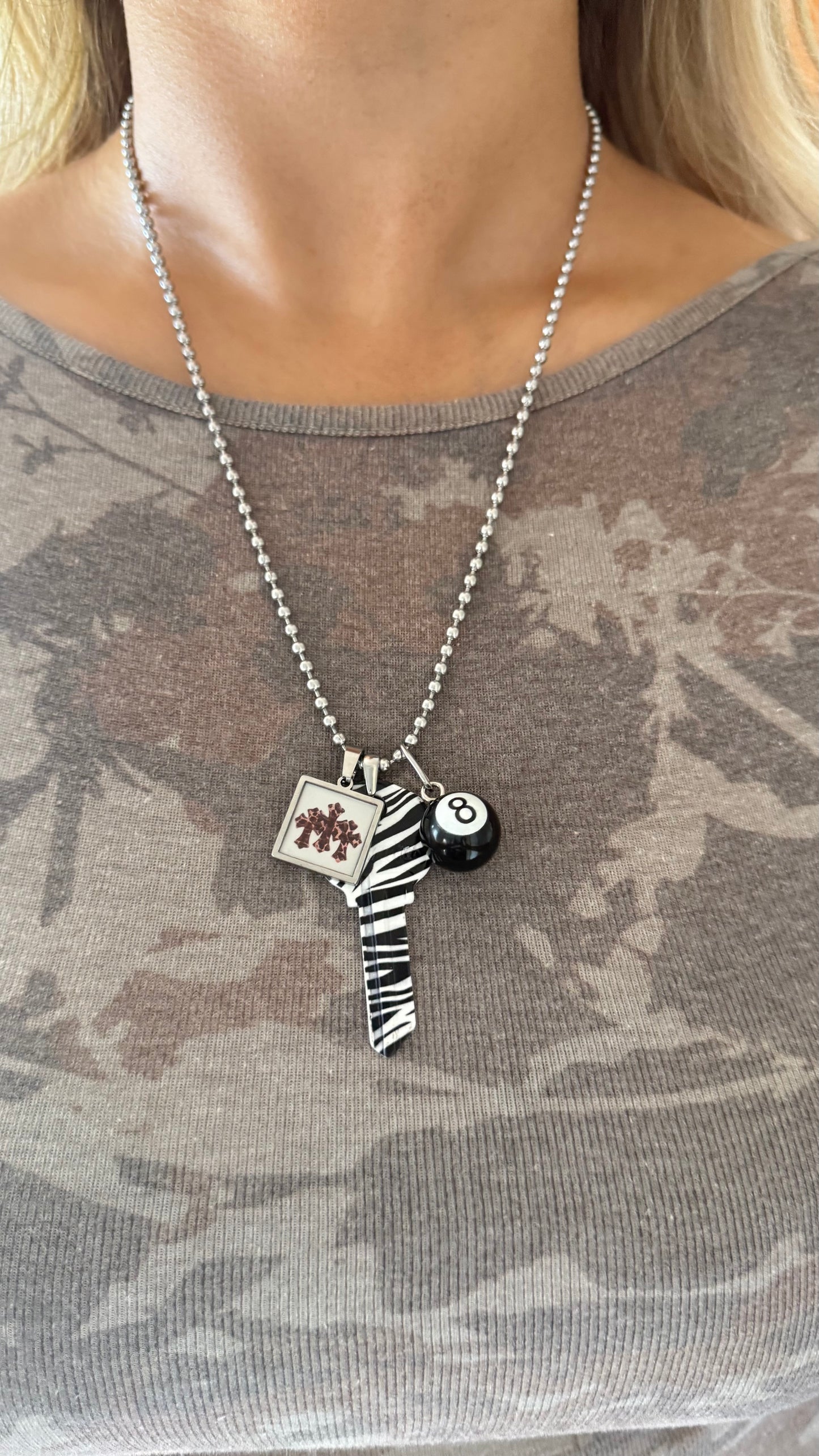 The “Zebra Cross-ing” Charm Necklace