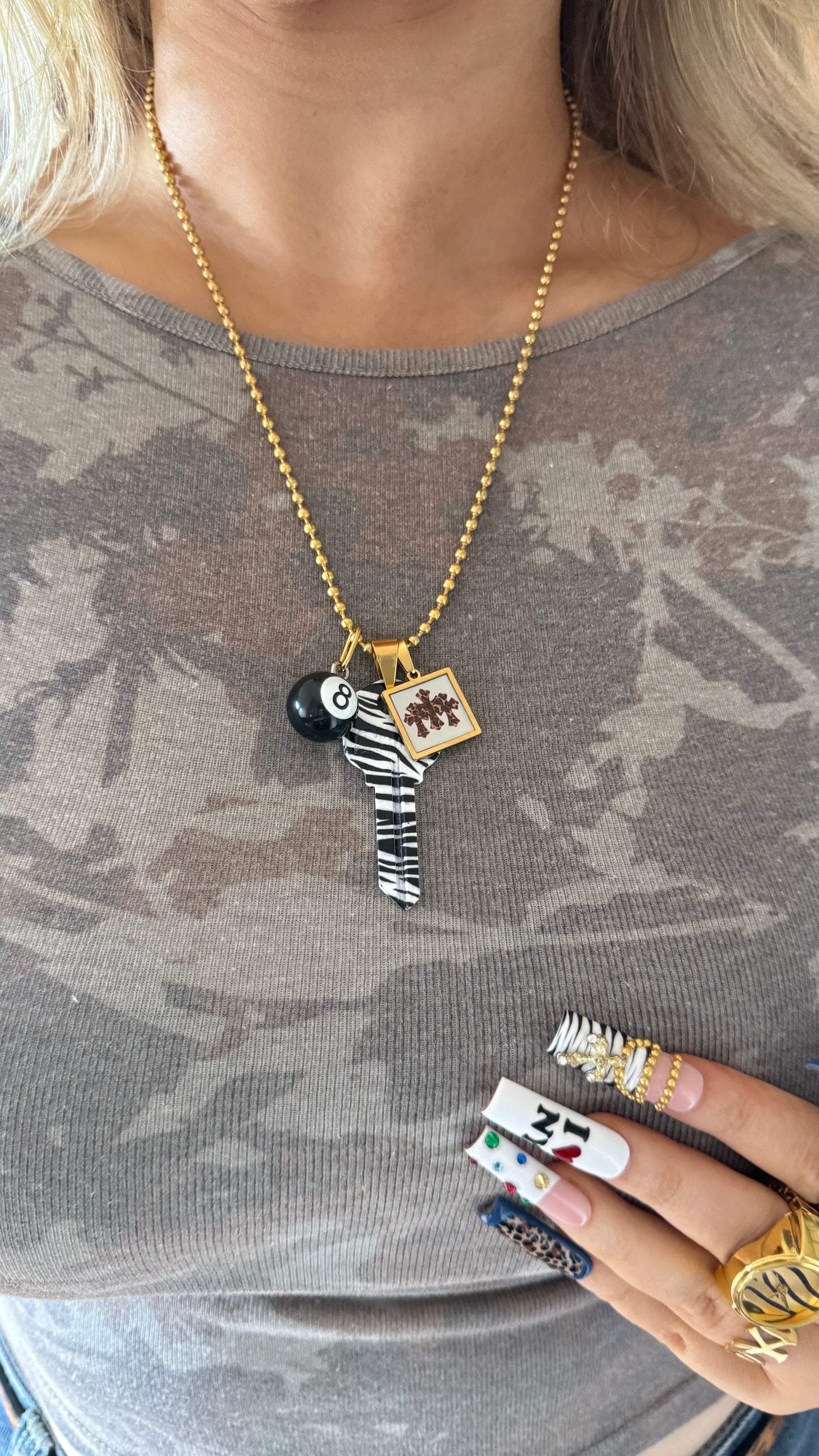 The “Zebra Cross-ing” Charm Necklace