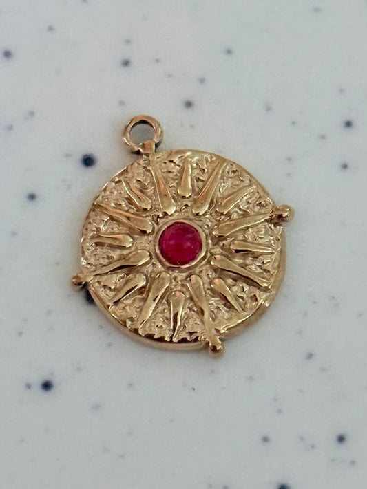 Textured Solar Medallion Red Stone Gold Charm